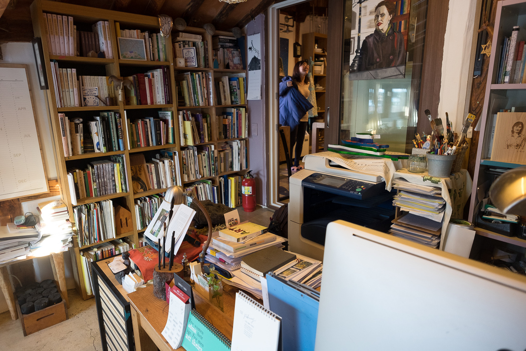 Lots of books, some of them written by Kyung-ah herself, in her study.