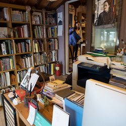 Lots of books, some of them written by Kyung-ah herself, in her study.