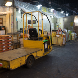 An electric delivery truck inside the Garak market.