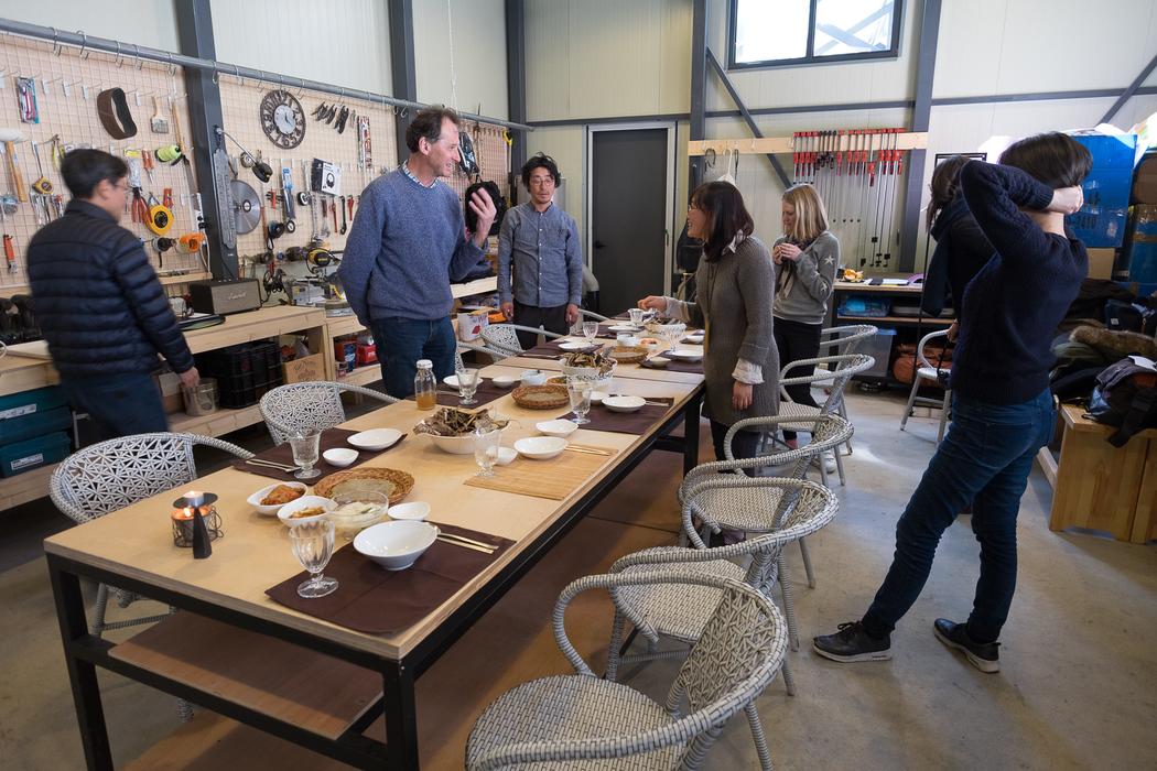 The team get ready for lunch. Mr. and Mrs. Kim's house.