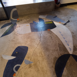 Whales on the kitchen floor, painted by Kyung-ah's younger daughter.