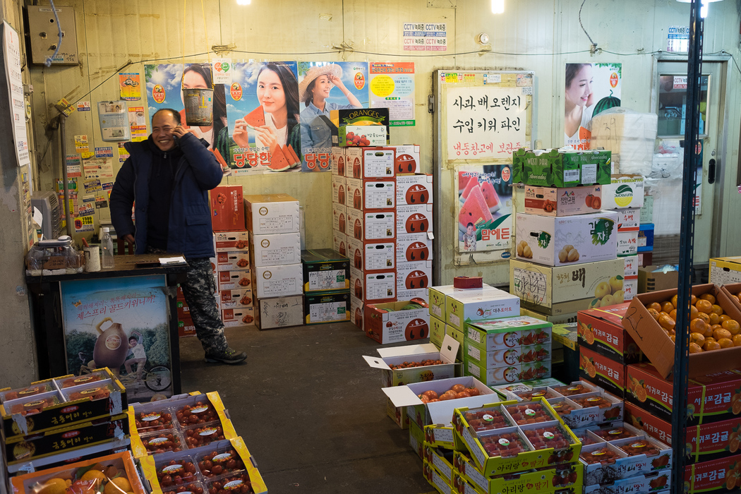 A fruit seller inside the Garak market.