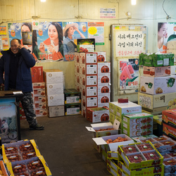 A fruit seller inside the Garak market.