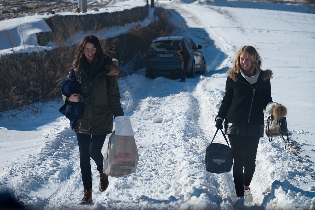 Giving up on the car, stuck in the snow, on the road up to the apple farm.