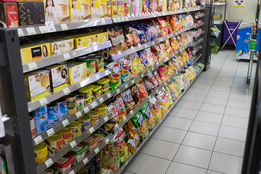 Crisps and snacks in a convenience store.