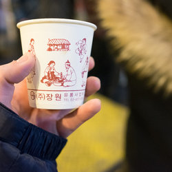 A cup of mixed coffee, costing 800 won (about 50p), served in the Garak market.