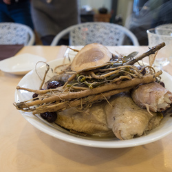 Chicken stew, cooked with many different types of wood in order to imbue flavour. Mr. and Mrs. Kim's house.